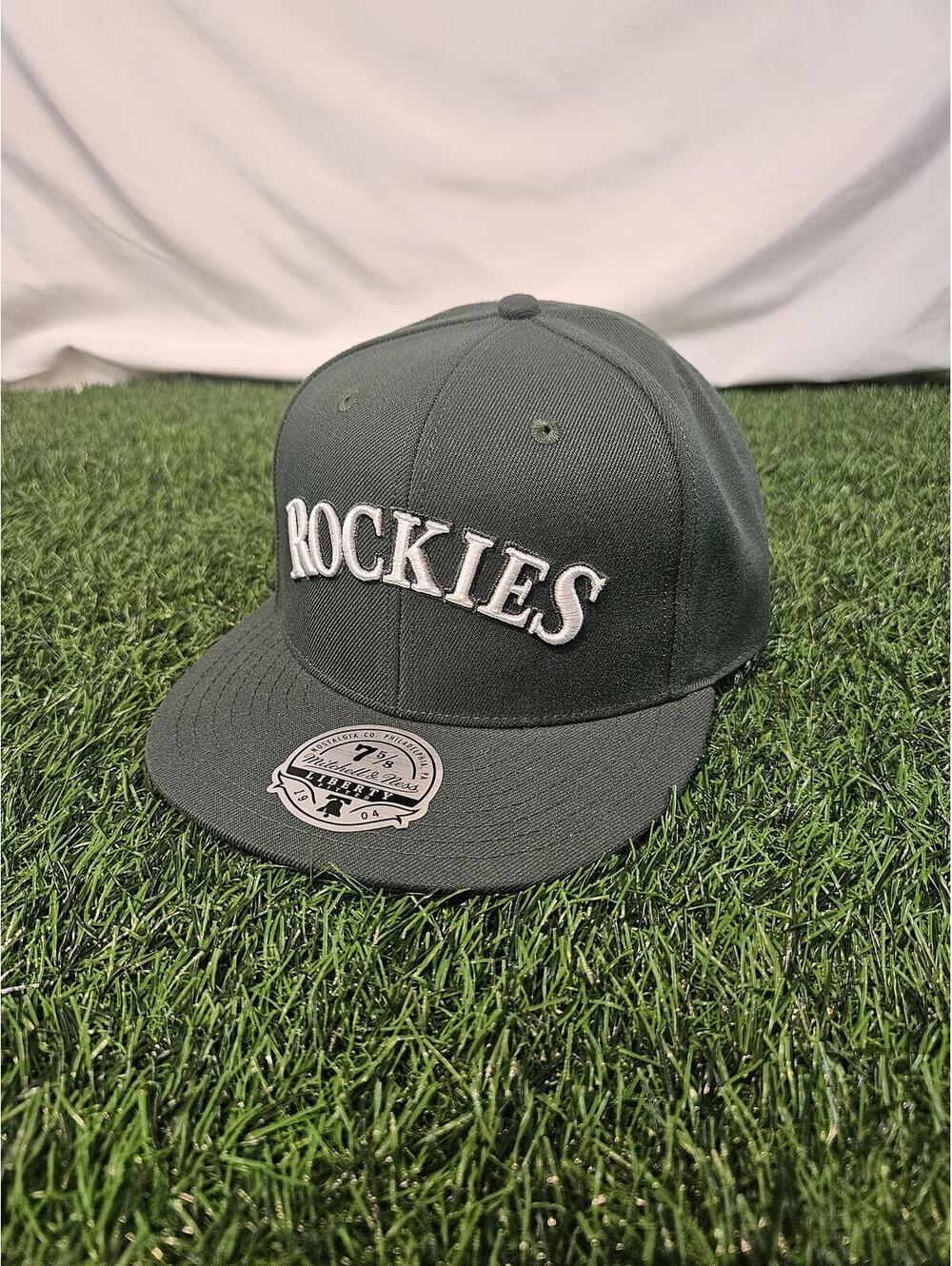 Dark Green Mitchell & Ness Colorado Rockies fitted hat with a flat brim 7 5/8
